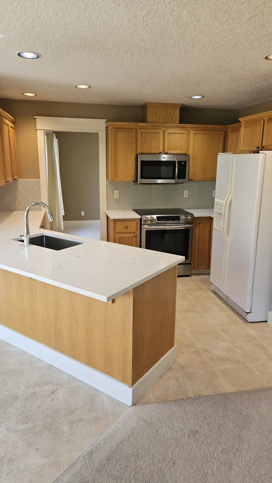 Clean kitchen counters, sink, and appliance surfaces after a Clary Clean move-out cleaning service